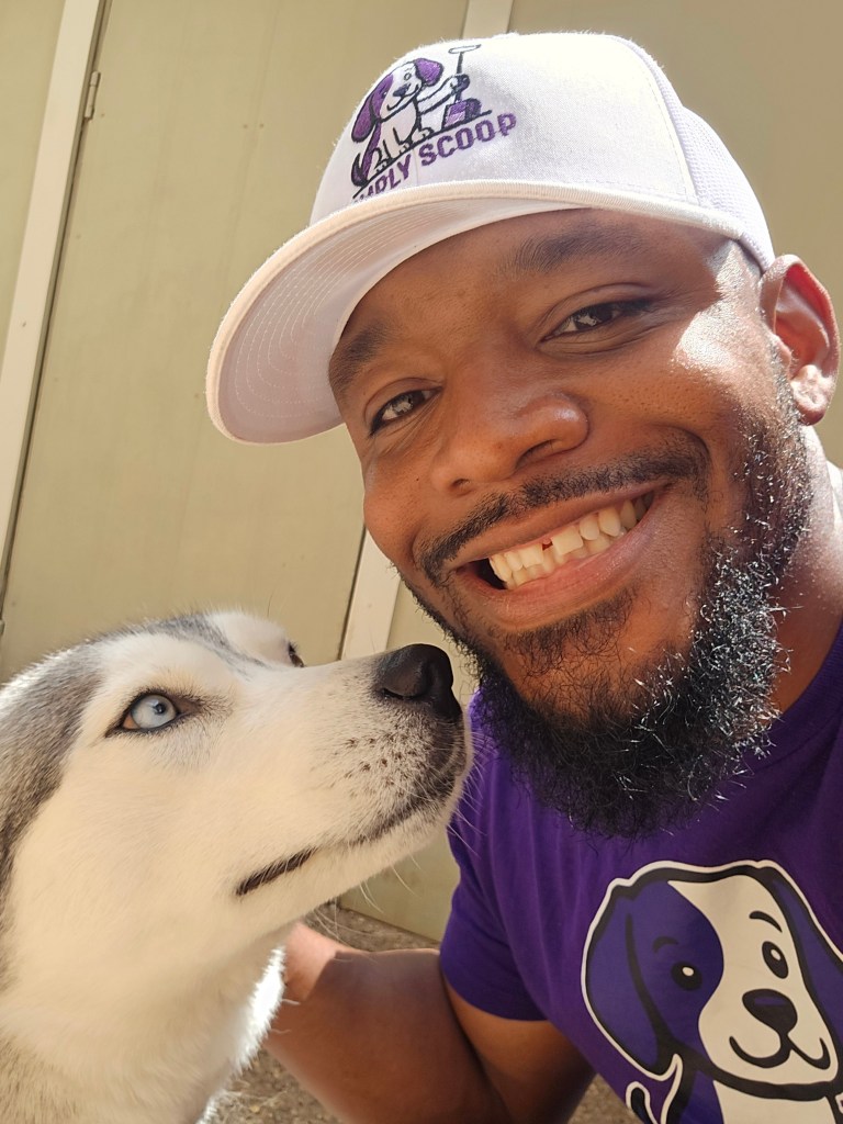 Man and dog smiling together